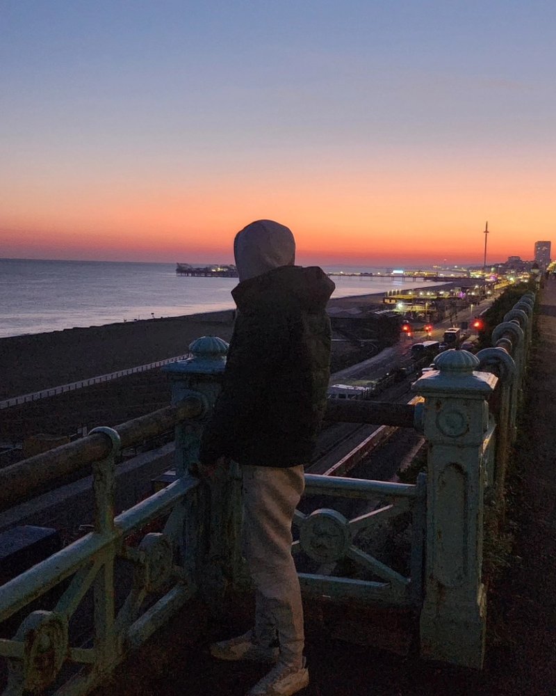 Sammy Morgan on Brighton seafront at sunset