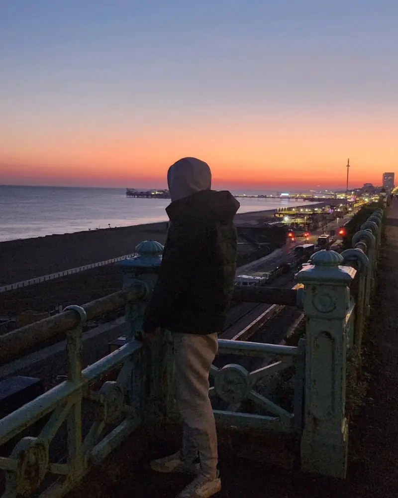 Sammy Morgan on Brighton seafront at sunset